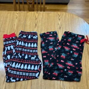 NWOT 2 pairs Christmas pajama bottoms. 95% polyester/5% spandex. Super comfy!